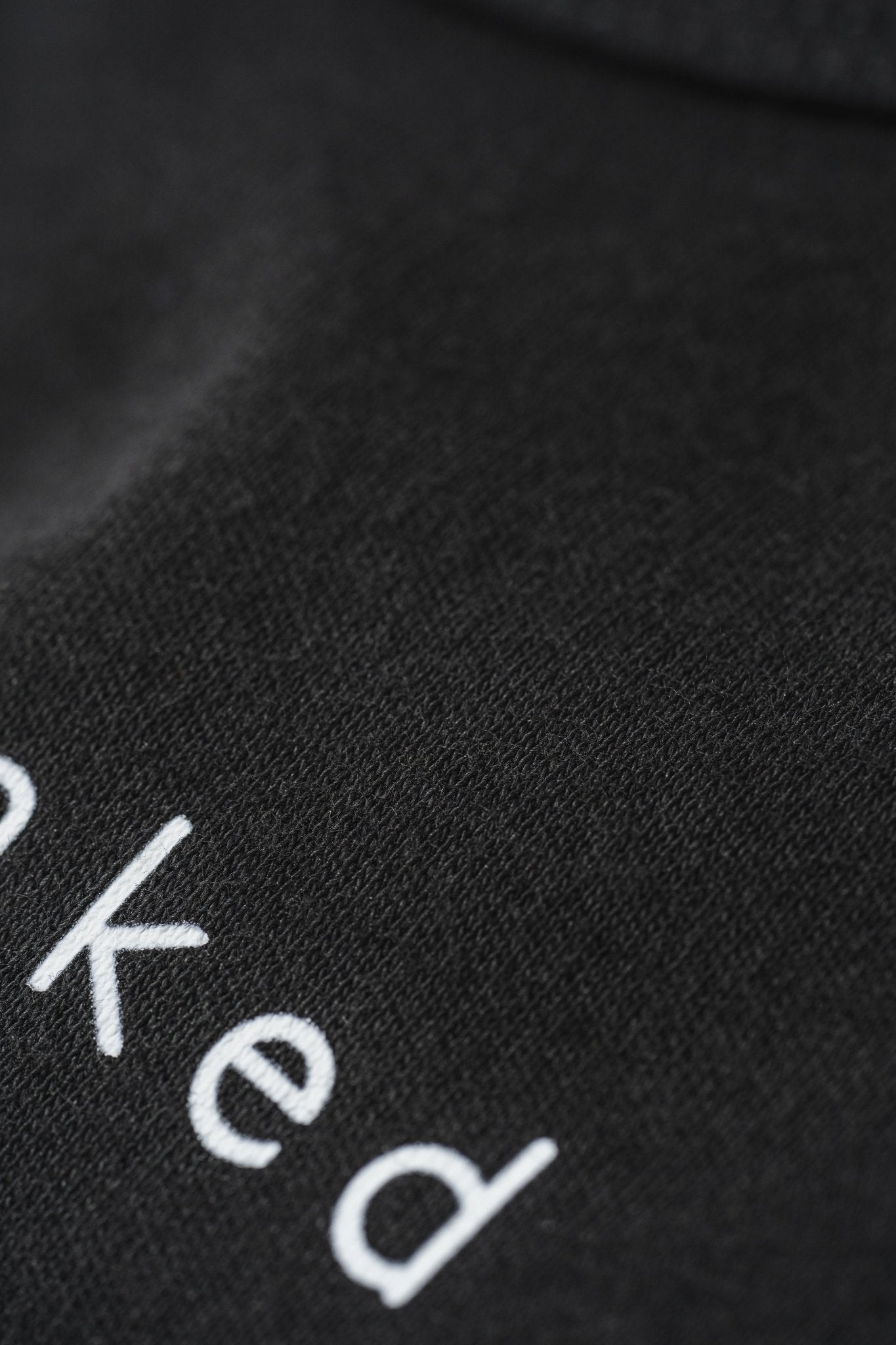 'Freshly Baked' baby bun Onesie in Black