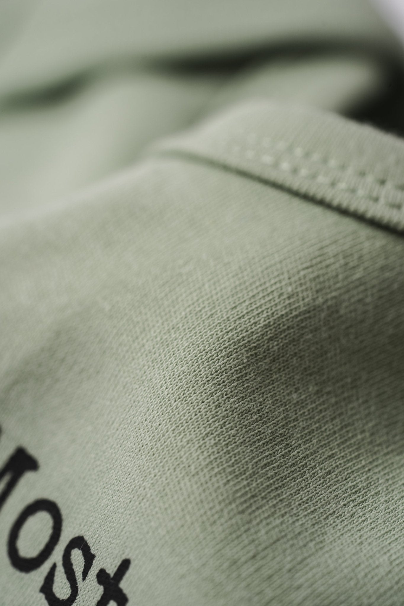 Little Human Alarm Clock Onesie in Green